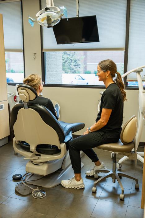 dentist with patient at poff dental associates | suresmile bellevue tn
