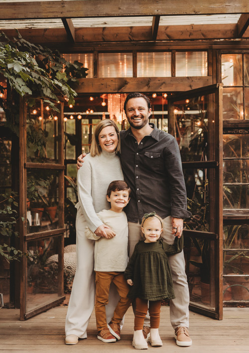 Poff Dental Associates Happy family standing together at Poff Dental Associates, showcasing a warm, family-friendly atmosphere, emphasizing their commitment to comprehensive dental care for all ages.